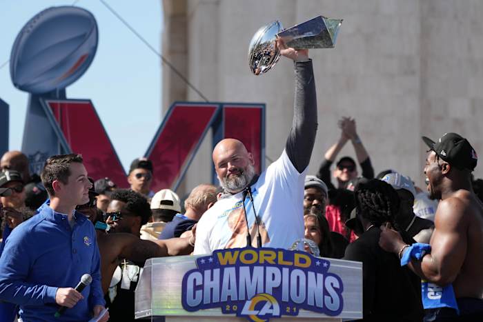 Feb 16, 2022; Los Angeles, CA, USA; Los Angeles Rams tackle Andrew Whitworth holds the Vince Lombardi trophy during the Super Bowl LVI championship rally at the Los Angeles Memorial Coliseum. Mandatory Credit: Kirby Lee-USA TODAY Sports